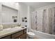Well-lit bathroom featuring a large sink and vanity combination plus a combined tub and shower at 2866 Judah St, The Villages, FL 32163