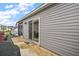 This home features a screened porch, sliding glass door, and outdoor patio area at 2866 Judah St, The Villages, FL 32163