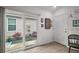The mud room features lots of natural light, an outdoor view and beautiful decor at 2866 Judah St, The Villages, FL 32163
