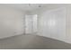 Bedroom featuring plush carpets, a ceiling fan, and ample closet space at 2935 Cedar Grove Loop, The Villages, FL 32163