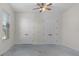 Large room with a ceiling fan and view from the window at 2935 Cedar Grove Loop, The Villages, FL 32163