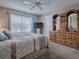 Comfortable bedroom with plenty of storage space and natural light at 3067 Southern Trce, The Villages, FL 32162
