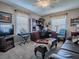 Functional home office featuring a large desk, comfortable seating, and ample storage for productivity at 3067 Southern Trce, The Villages, FL 32162