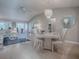 Open-concept living and dining area with neutral colors and ample natural light at 3067 Southern Trce, The Villages, FL 32162
