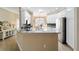 Open kitchen with granite countertops, stainless steel appliances, and plenty of counter space at 3234 Berkeley Ln, The Villages, FL 32162