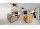 Open-concept living room with tile flooring, recessed lighting, and a view into the dining area at 3234 Berkeley Ln, The Villages, FL 32162