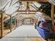 View of an attic space with wood beams and insulation at 3654 Enterprise Dr, The Villages, FL 32163