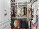 Organized closet with hanging rods, shelving, and ample storage space for clothes and accessories at 3654 Enterprise Dr, The Villages, FL 32163