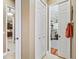 Hallway view leading to a home office with built-in storage and a work area at 3654 Enterprise Dr, The Villages, FL 32163