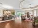 Spacious floorplan with combined dining and living spaces provides ample seating and room to entertain at 3654 Enterprise Dr, The Villages, FL 32163