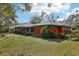 Expansive backyard featuring lush green grass, mature trees, and privacy at 36816 Taylor Mill Rd, Fruitland Park, FL 34731
