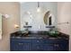 Bathroom featuring unique vessel sinks and granite countertop at 36816 Taylor Mill Rd, Fruitland Park, FL 34731