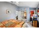 Bedroom with a view of the closet and bathroom, light walls and carpeted floor at 36816 Taylor Mill Rd, Fruitland Park, FL 34731