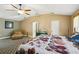 Bright main bedroom with comfortable sitting area and adjacent en-suite at 36816 Taylor Mill Rd, Fruitland Park, FL 34731