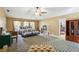 Spacious primary bedroom featuring natural light, neutral tones, and a large walk-in closet at 36816 Taylor Mill Rd, Fruitland Park, FL 34731