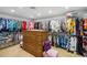 Large walk-in closet with custom shelving and organization system at 36816 Taylor Mill Rd, Fruitland Park, FL 34731