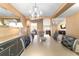 Dining room features a modern chandelier, stylish furniture, and is designed for gatherings at 4000 Se 98Th Pl, Belleview, FL 34420