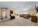 Spacious living room with an open layout, seamlessly blending with the dining area at 4000 Se 98Th Pl, Belleview, FL 34420