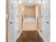 En-suite bathroom with hardwood flooring, a bathtub, and an enclosed shower at 4000 Se 98Th Pl, Belleview, FL 34420