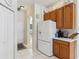 Kitchen area featuring ample storage and views into the adjacent rooms at 5135 Aurora Dr, Leesburg, FL 34748