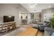 Spacious and open living area with access to dining room, kitchen and entryway at 5466 Compass Pt # 101, Oxford, FL 34484