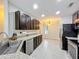 Well-equipped kitchen featuring stainless steel appliances, granite countertops, and ample cabinet space at 5891 Forest Ridge Dr, Winter Haven, FL 33881