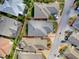 Aerial view of a home with property outline in a residential neighborhood at 591 Statesburg St, The Villages, FL 32162