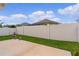 Image of private backyard space featuring concrete patio and well-maintained landscaping at 5934 Kaplan Ct, The Villages, FL 32163