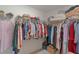 Walk-in closet with ample hanging space and shelving for organized storage at 5934 Kaplan Ct, The Villages, FL 32163