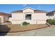 Charming single-story home showcasing a well-maintained yard and neutral-toned exterior at 731 Hernandez Dr, The Villages, FL 32159