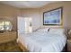 Serene main bedroom features ensuite bathroom and ample natural light at 737 Bolivar St, The Villages, FL 32159