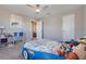 Bedroom featuring a car shaped bed, carpet floor, closet, and shelving at 831 Zeek Ridge Ct, Clermont, FL 34715