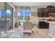 Charming dining area adjacent to the kitchen, offering bright natural light at 831 Zeek Ridge Ct, Clermont, FL 34715