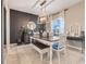 Bright dining room featuring elegant decor and modern lighting at 831 Zeek Ridge Ct, Clermont, FL 34715