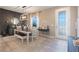 Dining room with decorative accents and a stylish light fixture at 831 Zeek Ridge Ct, Clermont, FL 34715