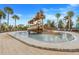 can cool off on the warm days at the community water park that has a play structure and seating area at 831 Zeek Ridge Ct, Clermont, FL 34715