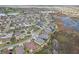Picture showing the community homes as well as the proximity to local wetlands at 960 Pickering Path, The Villages, FL 32163