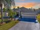 Charming single-Gathering home with a well-manicured lawn and a two-car garage at 998 Sayle St, The Villages, FL 32162
