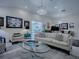 Comfortable living room featuring stylish furniture, art, and a bright, airy atmosphere at 998 Sayle St, The Villages, FL 32162