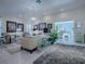 Welcoming living room with modern decor, comfortable seating, and ample natural light at 998 Sayle St, The Villages, FL 32162