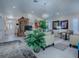 Bright living room featuring modern furniture, elegant decor, and an open layout at 998 Sayle St, The Villages, FL 32162