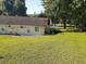 View of home with well-maintained lawn, ideal for outdoor activities at 10301 Us Highway 27 # 39, Clermont, FL 34711