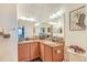 Bathroom featuring a double vanity, granite countertops and tiled flooring at 1037 Green Gate Blvd, Groveland, FL 34736