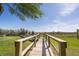 A view from a wooden pier that overlooks the waterfront at 1037 Green Gate Blvd, Groveland, FL 34736