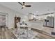 Inviting dining area open to kitchen, perfect for Gathering gatherings at 1106 Blythe Way, The Villages, FL 32162