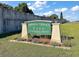 Entrance sign for Imperial Terrace East, a deed-restricted 55+ community, surrounded by well-maintained landscaping at 1112 Forest Ln, Tavares, FL 32778