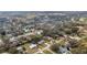 An aerial view showcases the property lines of the lot nestled in a serene neighborhood with lush greenery at 119 E Croton Way, Howey In The Hills, FL 34737