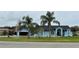 Charming single-story home featuring a well-manicured lawn and beautiful curb appeal at 12066 Se 60Th Avenue Rd, Belleview, FL 34420