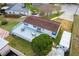 Aerial view of house featuring a spacious deck perfect for outdoor living at 12221 Helena Ct, Leesburg, FL 34788