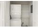 Conveniently located laundry closet featuring a stacked washer and dryer at 123 Dresdan Ct, Sanford, FL 32771